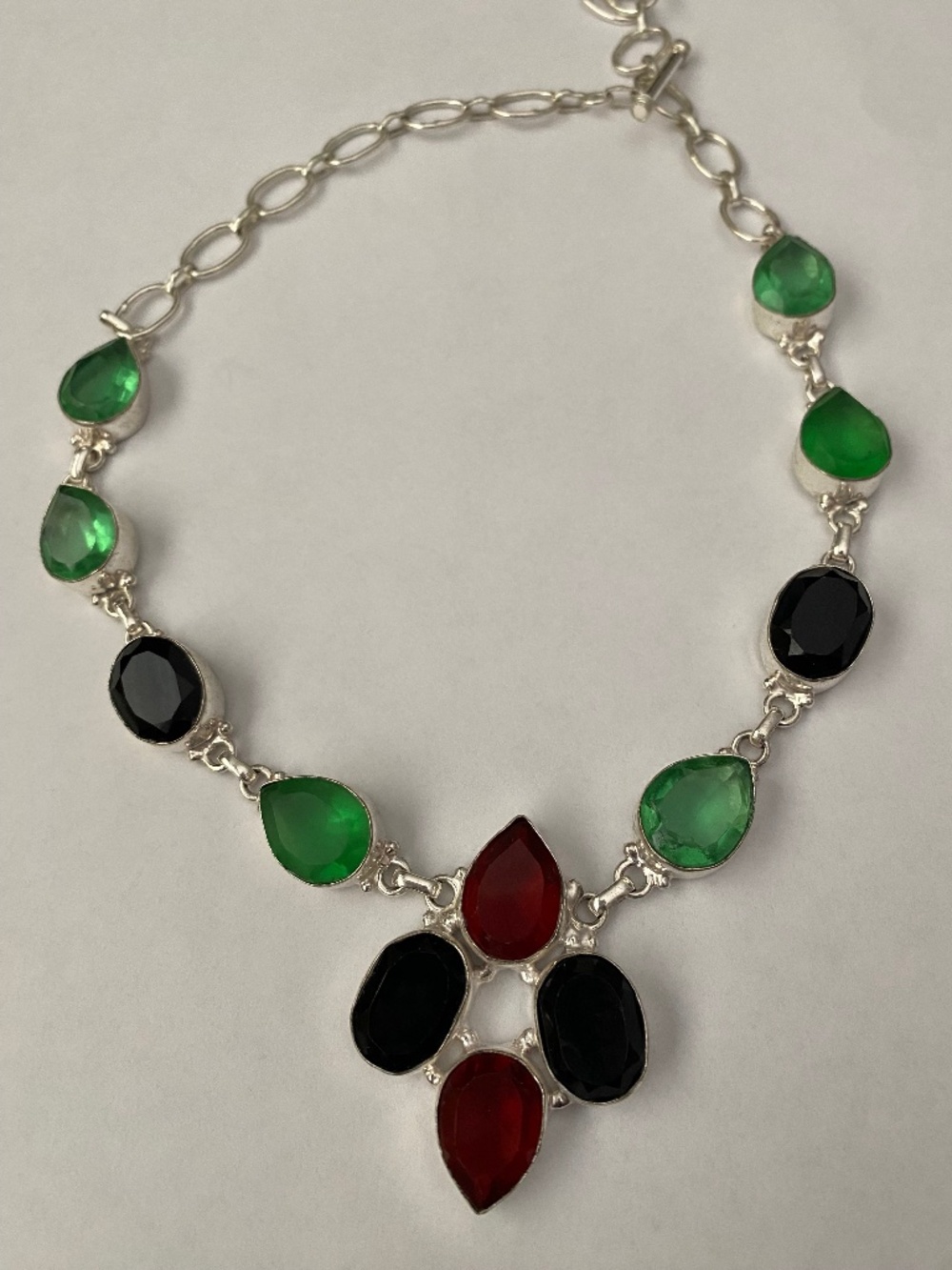 Sterling necklace teardrop & oval gemstones in red, green, & black stones